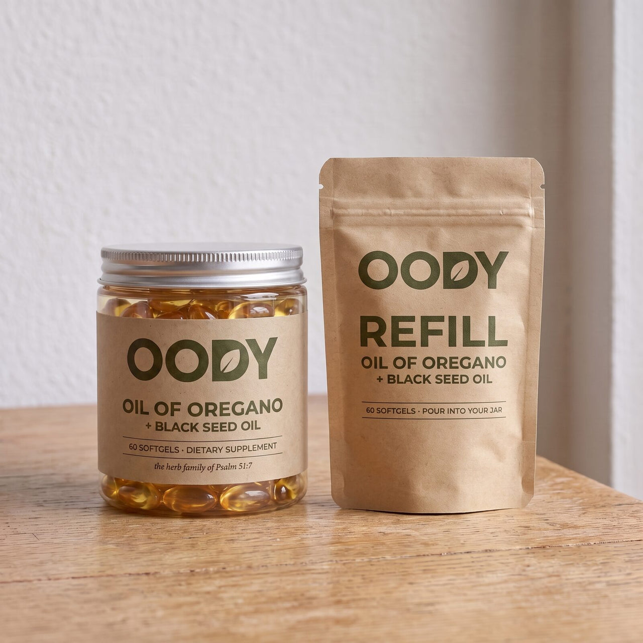 OODY jar next to its kraft refill pouch