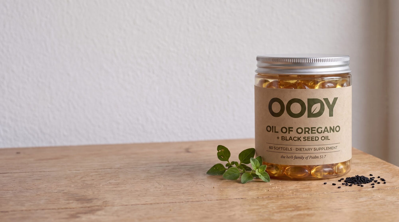 OODY Oil of Oregano jar on an oak table